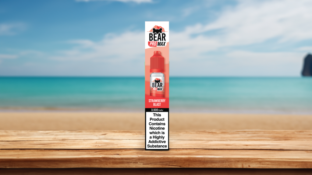 strawberry blast bear pro max 10ml salt vape juice on beach background